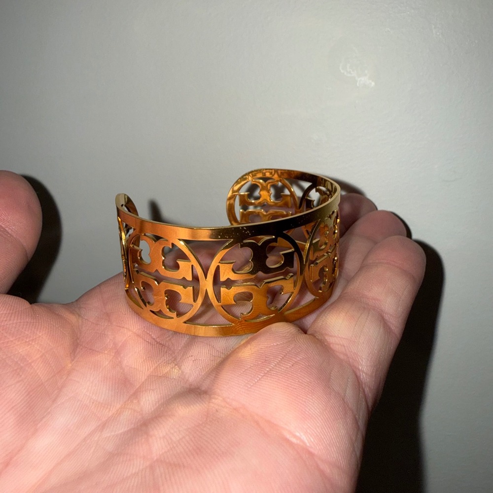 Tory Burch Gold Toned Double T Logo Filigree Cutout Statement Cuff Bracelet